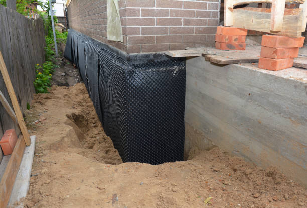 Happy homeowners after waterproofing job in Cordova
